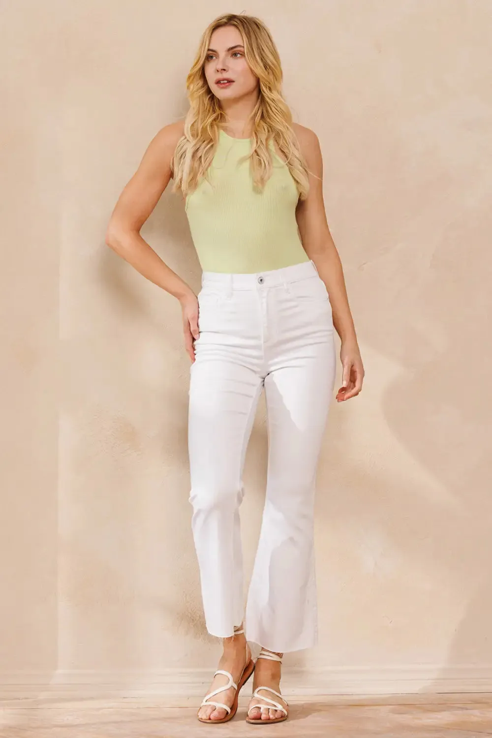 HIGH RISE WHITE CROPPED KICK FLARE WITH RAW CUT HEM