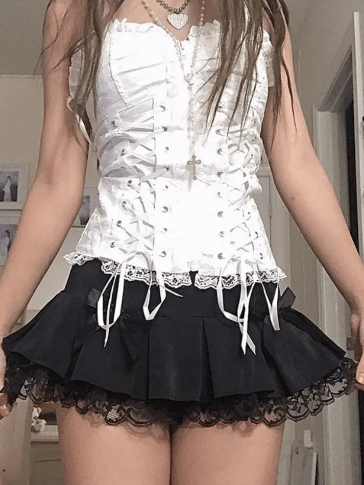 Joskaa Bow Lace Paneled Pleated Mini Skirt
