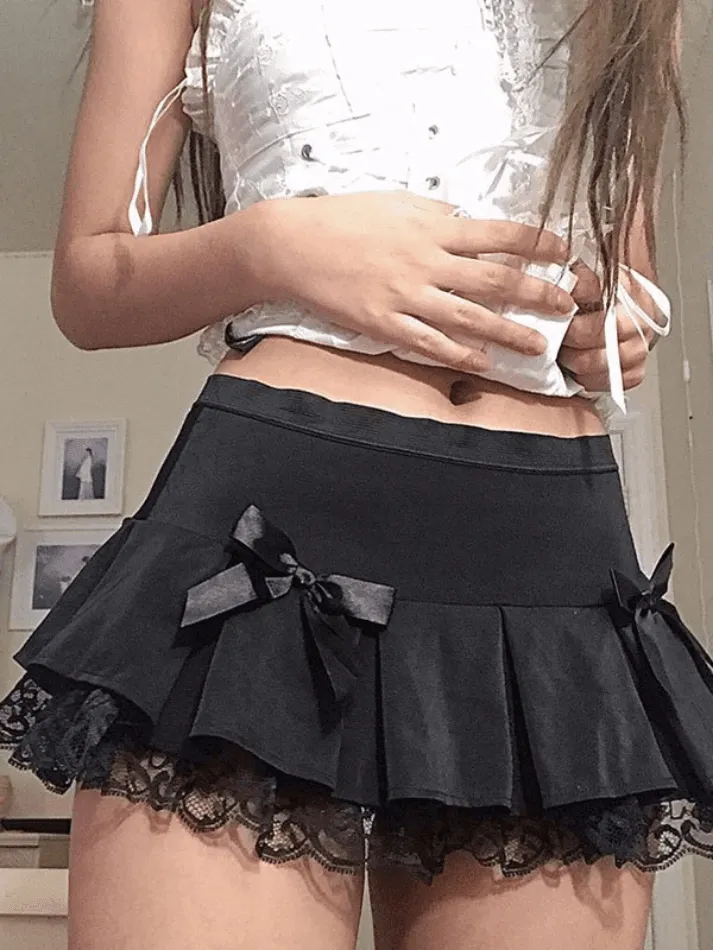 Joskaa Bow Lace Paneled Pleated Mini Skirt
