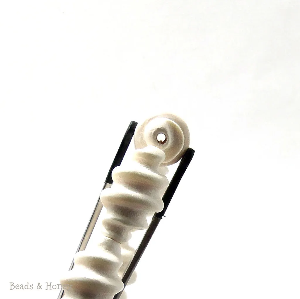 Whitewood Bleached Carved Spiral 12x24mm (Half Strand)